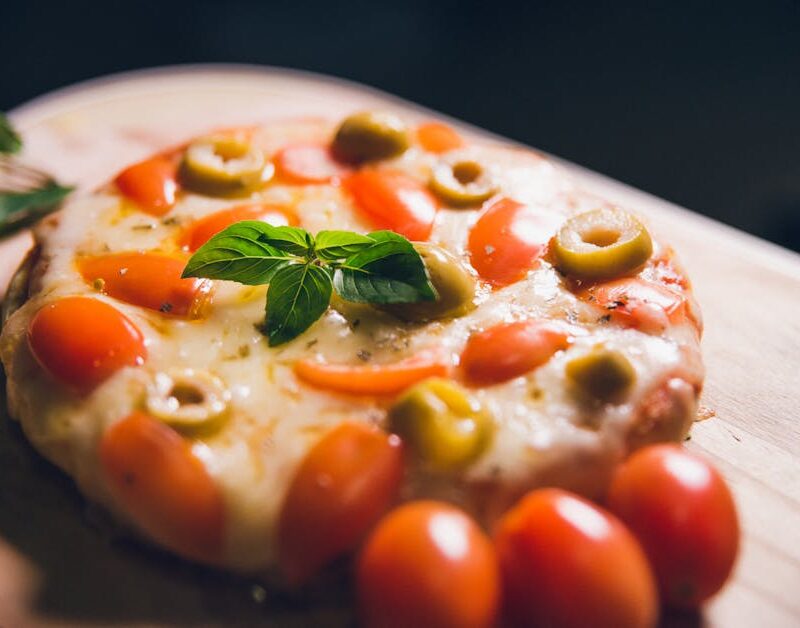 Food Aesthetics - Mouth-watering pizza topped with fresh basil, to #14373594