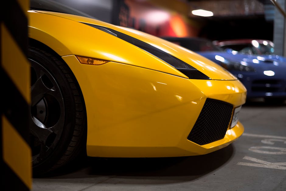 Luxury Cars - Close-up of a vibrant yellow Lamborghini Gallard #16040415