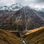 Mountain Landscapes - Breathtaking view of a snow-capped mountain and  #17641872