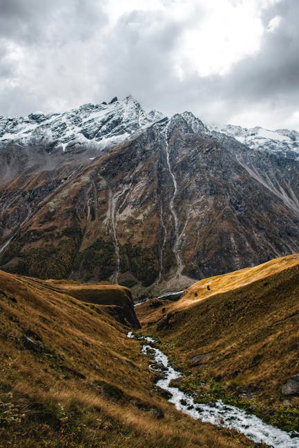 Mountain Landscapes - Breathtaking view of a snow-capped mountain and  #17641872