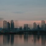 City Architecture - A moody cityscape of Singapore's skyline at dusk #18095416
