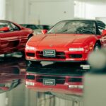 Luxury Cars - Elegant red sports car displayed in a luxury car #18434005