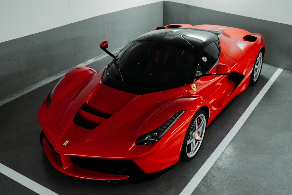 Luxury Cars - A stunning red Ferrari supercar parked indoors, #28868891