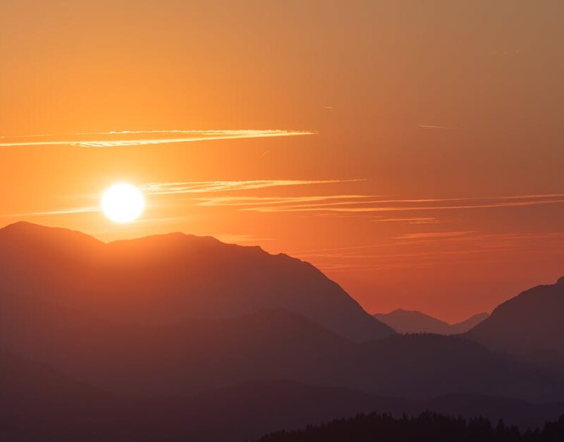 Mountain Landscapes - Beautiful sunrise casting warm light over a pict #33846784